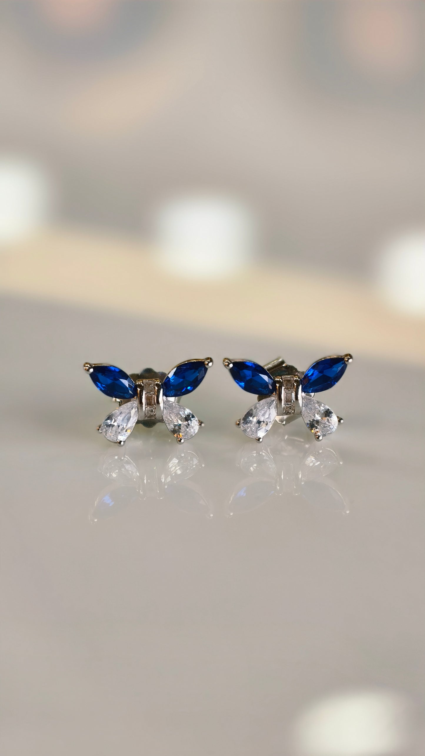 Contrasting Blue and White Marquise Wing Studs